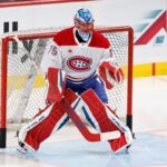 Jakub Dobes devant le filet du Canadien, chandail blanc