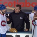 Phillip Danault en entrevue au banc des Canadiens à Winnipeg, Zachary Bolduc à ses côtés