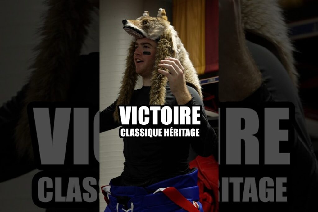 Jacob Fowler portant le chapeau du loup dans le vestiaire après la victoire à la Classique Héritage