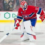 Jacob Fowler, gardien des Canadiens, en action avec son bâton